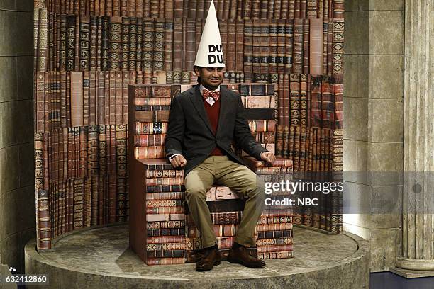 Aziz Ansari" Episode 1716 -- Pictured: Aziz Ansari as the Bookworm during the "Beat the Bookworm" sketch on January 21st, 2017 --