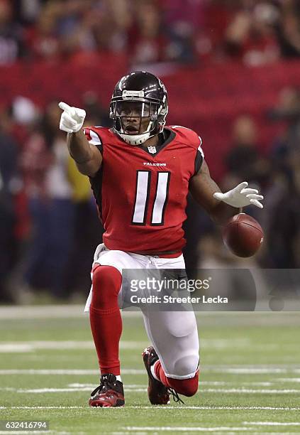 Julio Jones of the Atlanta Falcons signals a first down in the third quarter against the Green Bay Packers in the NFC Championship Game at the...