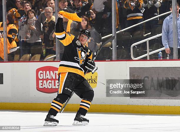 Sidney Crosby of the Pittsburgh Penguins waves the terrible towel after defeating the Boston Bruins 5-1 at PPG Paints Arena on January 22, 2017 in...