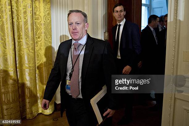 Sean Spicer, White House press secretary, arrives to a swearing in ceremony of White House senior staff in the East Room of the White House on...