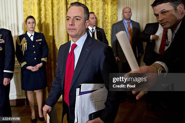 Reince Priebus, White House chief of staff, arrives to a swearing in ceremony of White House senior staff in the East Room of the White House on...