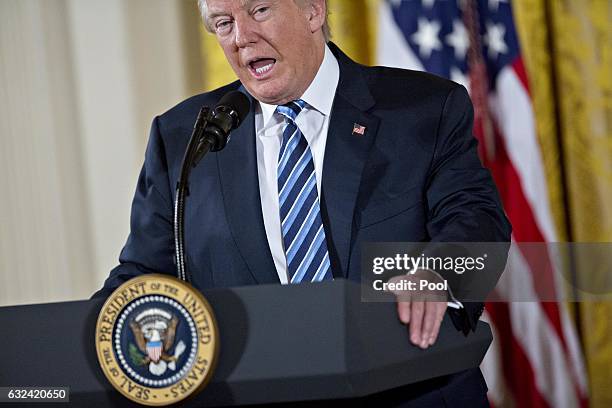 President Donald Trump speaks during a swearing in ceremony of White House senior staff in the East Room of the White House on January 22, 2017 in...