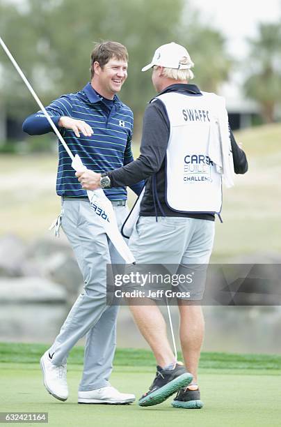 Hudson Swafford celebrates with caddie D.J. Nelson during the final round of the CareerBuilder Challenge in partnership with The Clinton Foundation...