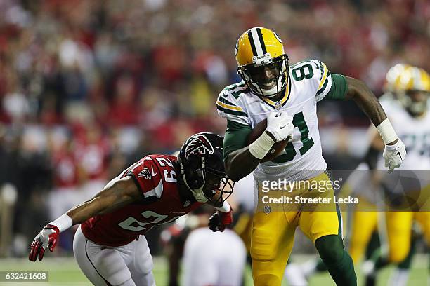 Geronimo Allison of the Green Bay Packers is pursued by C.J. Goodwin of the Atlanta Falcons in the NFC Championship Game at the Georgia Dome on...