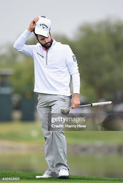 Adam Hadwin of Canada reacts to his putt during the final round of the CareerBuilder Challenge in partnership with The Clinton Foundation at the TPC...