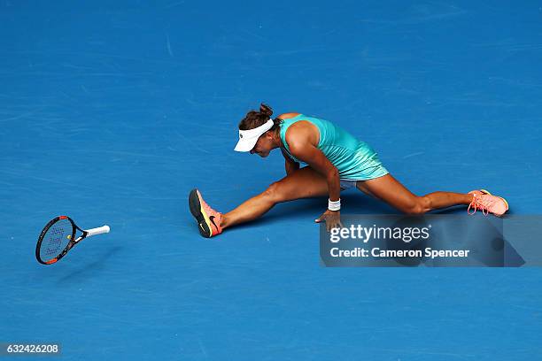 Barbora Strycova of the Czech Republic falls over in her fourth round match against Serena Williams of the United States on day eight of the 2017...