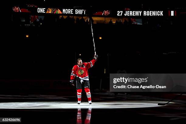 Former Chicago Blackhawks forward Jeremy Roenick is honored during the Blackhawks "One More Shift" campaign prior to the game against the Vancouver...