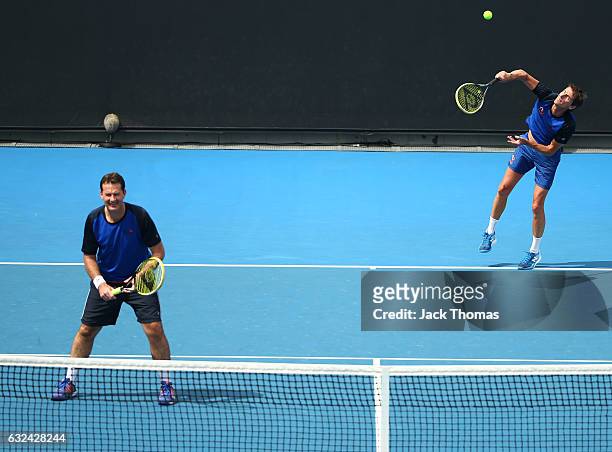Jacco Eltingh and Paul Haarhuis of the Netherlands compete in the first round legends match against Michael Chang and Todd Martin of the United...