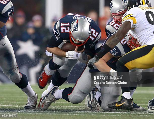Patriots Tom Brady makes a quarterback sneak in the third quarter. The England Patriots host the Pittsburgh Steelers in the AFC Championship game at...