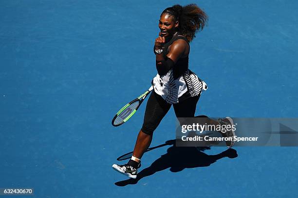 Serena Williams of the United States celebrates winning her fourth round match against Barbora Strycova of the Czech Republic on day eight of the...