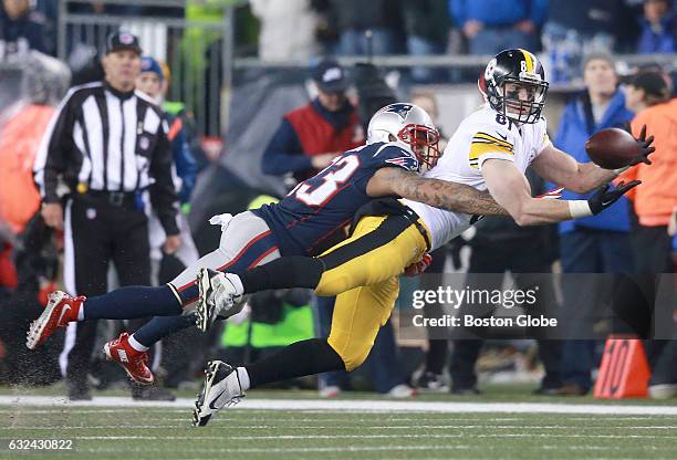 Patriots Patrick Chung breaks up a pass intended for Steelers Jesse James in the third quarter. The New England Patriots host the Pittsburgh Steelers...