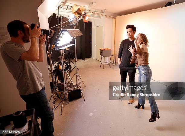 Actors John Cho and Haley Lu Richardson and photograher Jeff Vespa behind the scenes in the WireImage Portrait Studio at AT&T At The Lift during the...