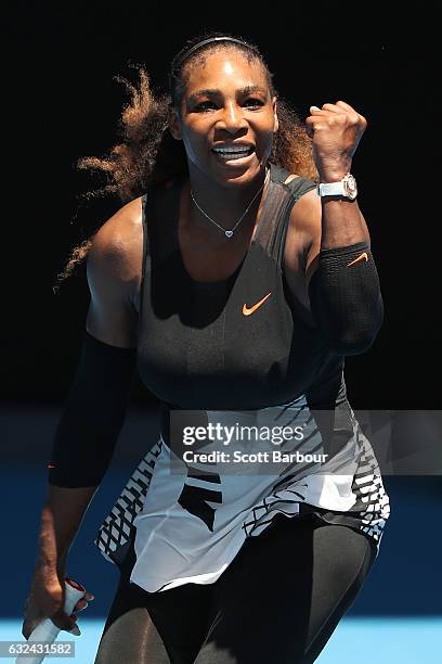 Serena Williams of the United States celebrates winning her fourth round match against Barbora Strycova of the Czech Republic on day eight of the...