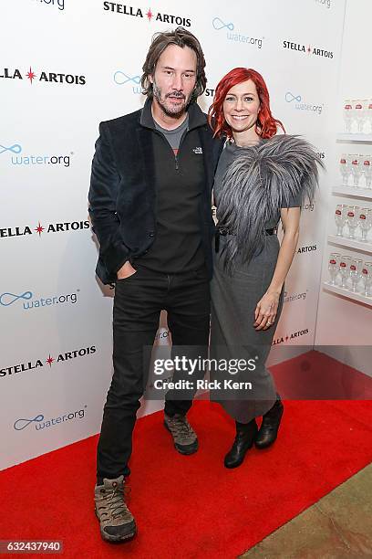 Keanu Reeves and Carrie Preston at the 'To the Bone' party in the Stella Artois Filmmaker Lounge during the Sundance Film Festival on January 22,...