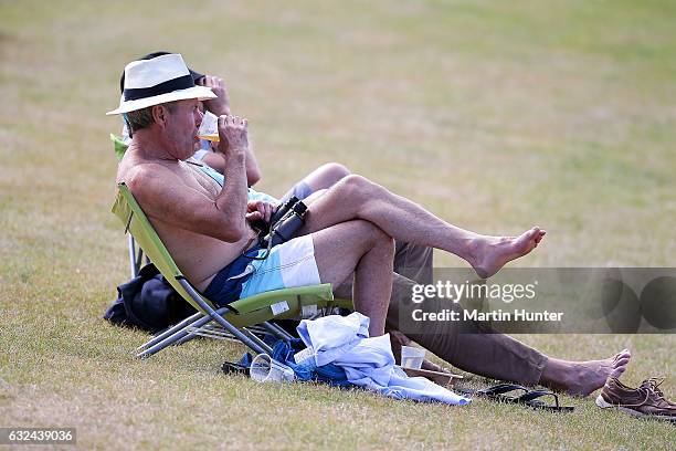 Cricket fans enjoing a beer during day four of the Second Test match between New Zealand and Bangladesh at Hagley Oval on January 23, 2017 in...