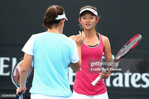 Yi Tsen Cho and Joanna Garland of Taipei compete in their first round match against Anri Nagata of Japan and Thasaporn Naklo of Thailand during the...