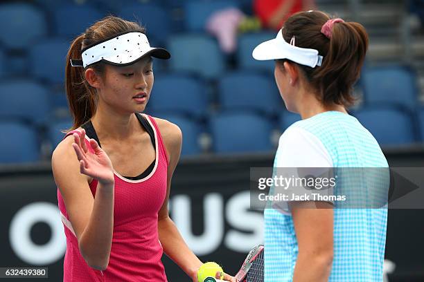 Yi Tsen Cho and Joanna Garland of Taipei compete in their first round match against Anri Nagata of Japan and Thasaporn Naklo of Thailand during the...