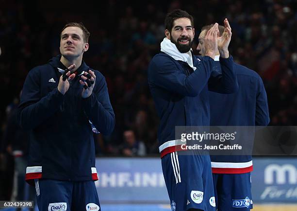 Kentin Mahe and Nikola Karabatic of France thank the supporters following the 25th IHF Men's World Championship 2017 Round of 16 match between France...