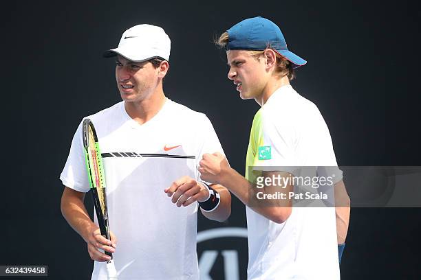 Zizou Bergs and Yshai Oliel compete against Emil Ruusuvuori and Michael Vrbensky in the doubles match during the Australian Open 2017 Junior...