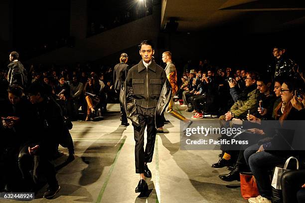 Models walk the catwalk during Sean Suen Studio show at Paris Men's Fashion Week Fall/Winter.