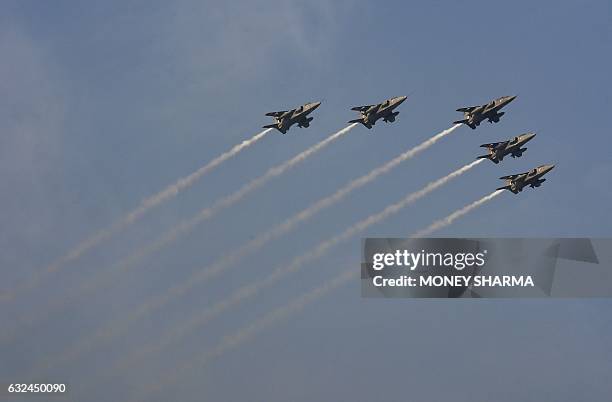 Indian fighter aircraft fly past during the full dress rehearsal for the upcoming Indian Republic Day parade in New Delhi on January 23, 2017. Crown...