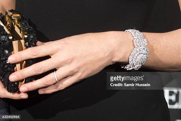 Carla Bruni, bracelet detail, attends Chopard presenting The Garden of Kalahari at Theatre du Chatelet on January 21, 2017 in Paris, France.
