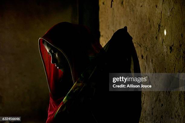 Jamalida is seen in her makeshift house that she shares with 4 other refugees on January 21, 2017 in Kutalong Rohingya refugee camp in Cox's Bazar,...