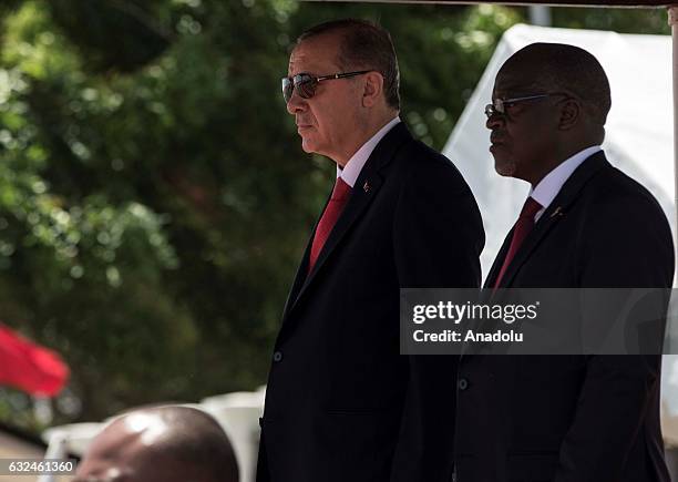 Turkish President Recep Tayyip Erdogan is welcomed by Tanzanian President John Magufuli during an official welcoming ceremony in Dar Es Salaam,...