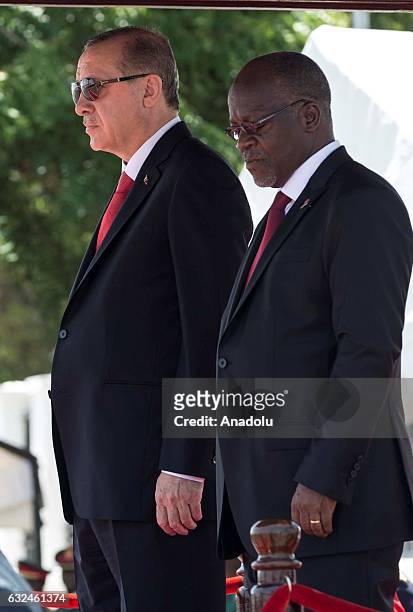 Turkish President Recep Tayyip Erdogan is welcomed by Tanzanian President John Magufuli during an official welcoming ceremony in Dar Es Salaam,...