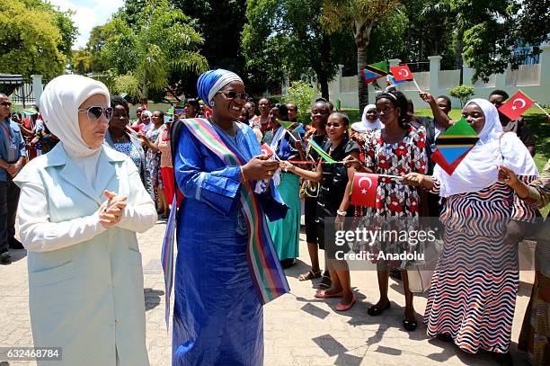 Turkish President Recep Tayyip Erdogan's wife Emine Erdogan and Tanzanian President John Pombe Joseph Magufuli's wife Janeth Magufuli greet Tanzanian...