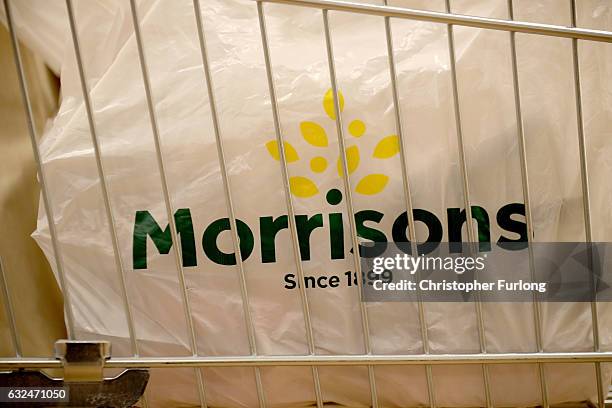 Branded shopping bag sits inside a trolley of goods inside a Morrisons supermarket on January 23, 2017 in Rochdale, England. Wm Morrison Supermarkets...