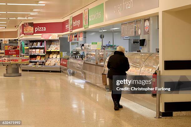 Shoppers buy groceries and goods inside Rochdale's Morrisons supermarket on January 23, 2017 in Rochdale, England. Wm Morrison Supermarkets Plc has...