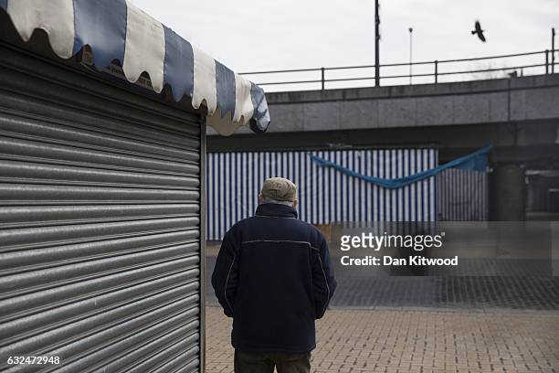 Man walks through a market stall area on January 23, 2017 in Milton Keynes, England. Milton Keynes in Buckinghamshire marks the 50th anniversary of...