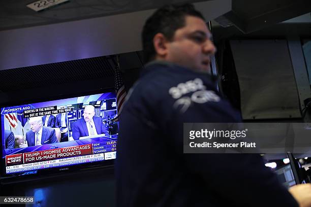 Traders work on the floor of the New York Stock Exchange on the first day of trading after Donald Trump was sworn in as president on January 23, 2017...
