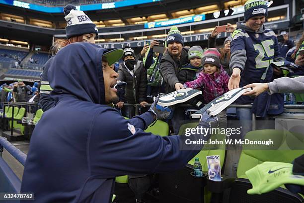 Playoffs: Seattle Seahawks player signing autographs for fans before game vs Detroit Lions at CenturyLink Field. Seattle, WA 1/7/2017 CREDIT: John W....