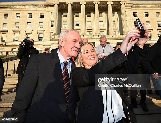 Michelle O'Neill, the new Sinn Fein leader in the north takes a selfie with Martin McGuinness on the steps of Stormont on January 23, 2017 in...