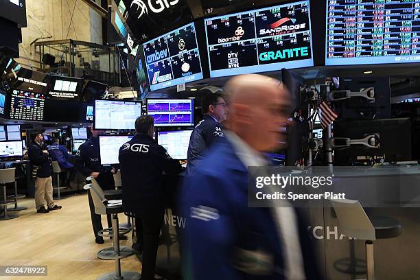 Traders work on the floor of the New York Stock Exchange on the first day of trading after Donald Trump was sworn in as president on January 23, 2017...