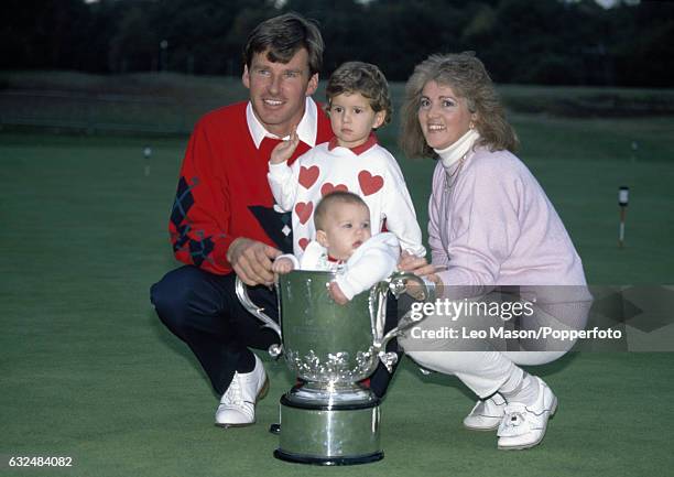 Nick Faldo of Great Britain with his wife Gill and children Natalie and Matthew after winning the Suntory World Match Play Championship at Wentworth...