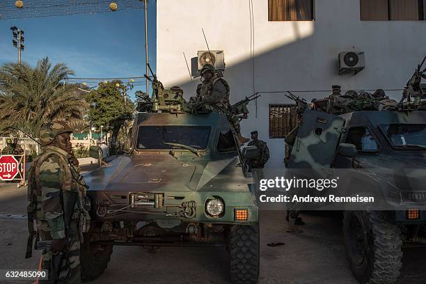 Troops from Senegal gather outside the Gambian statehouse on January 23, 2017 in Banjul, The Gambia. ECOWAS is in Gambia to ensure a safe transition...