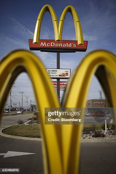 Signage stands outside a McDonald's Corp. Fast food restaurant in Bowling Green, Kentucky, U.S., on Wednesday, Jan. 18, 2017. McDonald's shares fell...