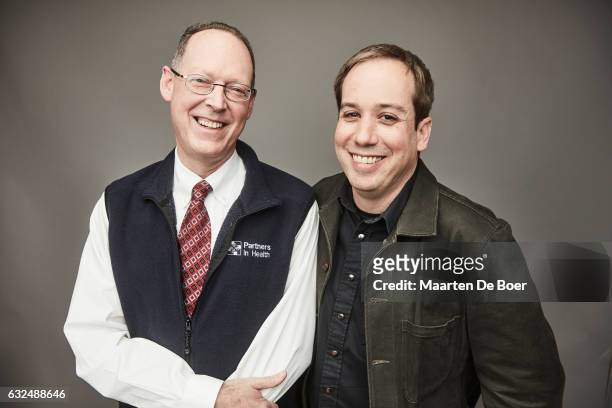 Dr. Paul Farmer and filmmaker Kief Davidson from the film "Bending the Arc" pose in the Getty Images Portrait Studio presented by DIRECTV during the...