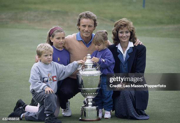 Bernhard Langer of West Germany with his wife Vikki and children Jackie, Stefan and Christina and the trophy after winning the Volvo PGA Championship...