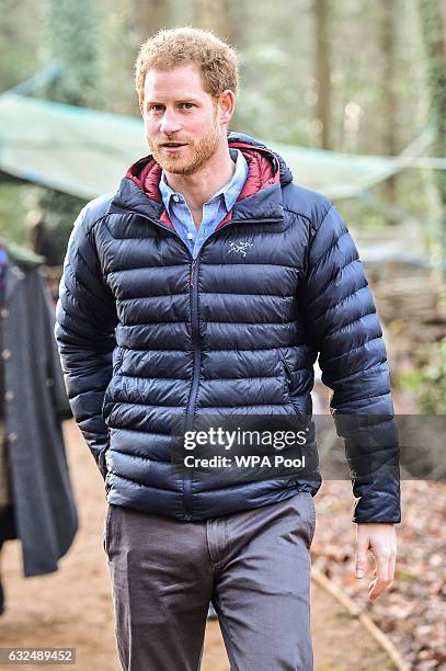 Prince Harry tours the woodland area during a visit to a Help For Heroes Recovery Centre at Tedworth House on January 23, 2017 in Wiltshire, England....