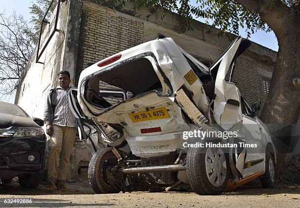 The damaged WagonR that was hit by a BMW car in an accident killing its driver at the police station , Vasant Vihar, on January 23, 2017 in New...