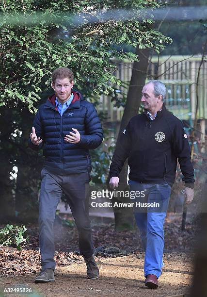 Prince Harry chats to Director of Recovery David Richmond during a visit to the Help for Heroes Recovery Centre at Tedworth House on January 23, 2017...