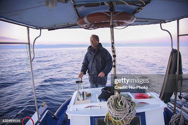 Images of the local fisherman in the tiny sea village Skala Sikamias, Thanasis Marmarinos, Greece, on 23 January 2017. He is saving refugees since...