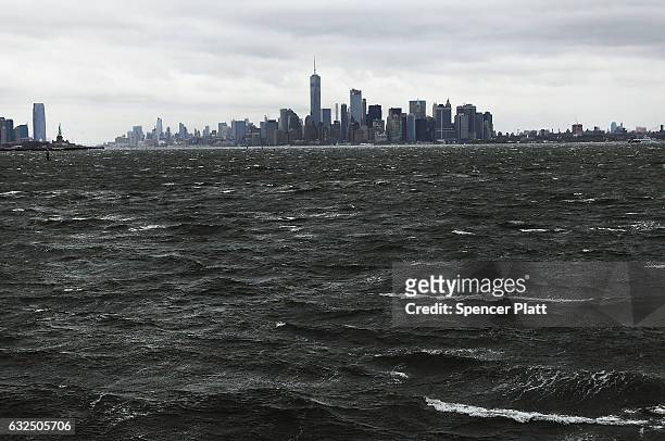 Manhattan sits under heavy cloud cover as the city prepares for a nor'easter storm on January 23, 2017 in New York City. The storm is expected to...