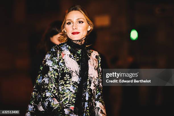 Olivia Palermo is wearing a floral print jacket, black leather pants, and black leather heels, after the Giambattista Valli show, during Paris...