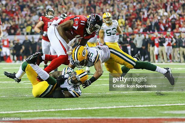 Atlanta Falcons wide receiver Julio Jones runs the ball after a catch and picks up a first down during the second half of the NFC Championship Game...