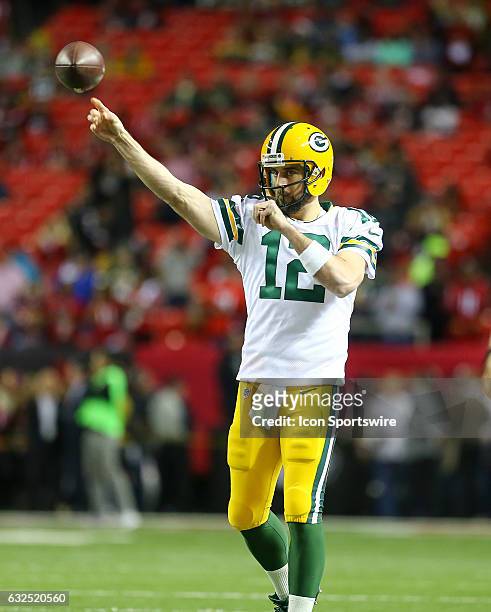 Green Bay Packers quarterback Aaron Rodgers throws the ball during warms up of the NFC Championship Game game between the Green Bay Packers and the...